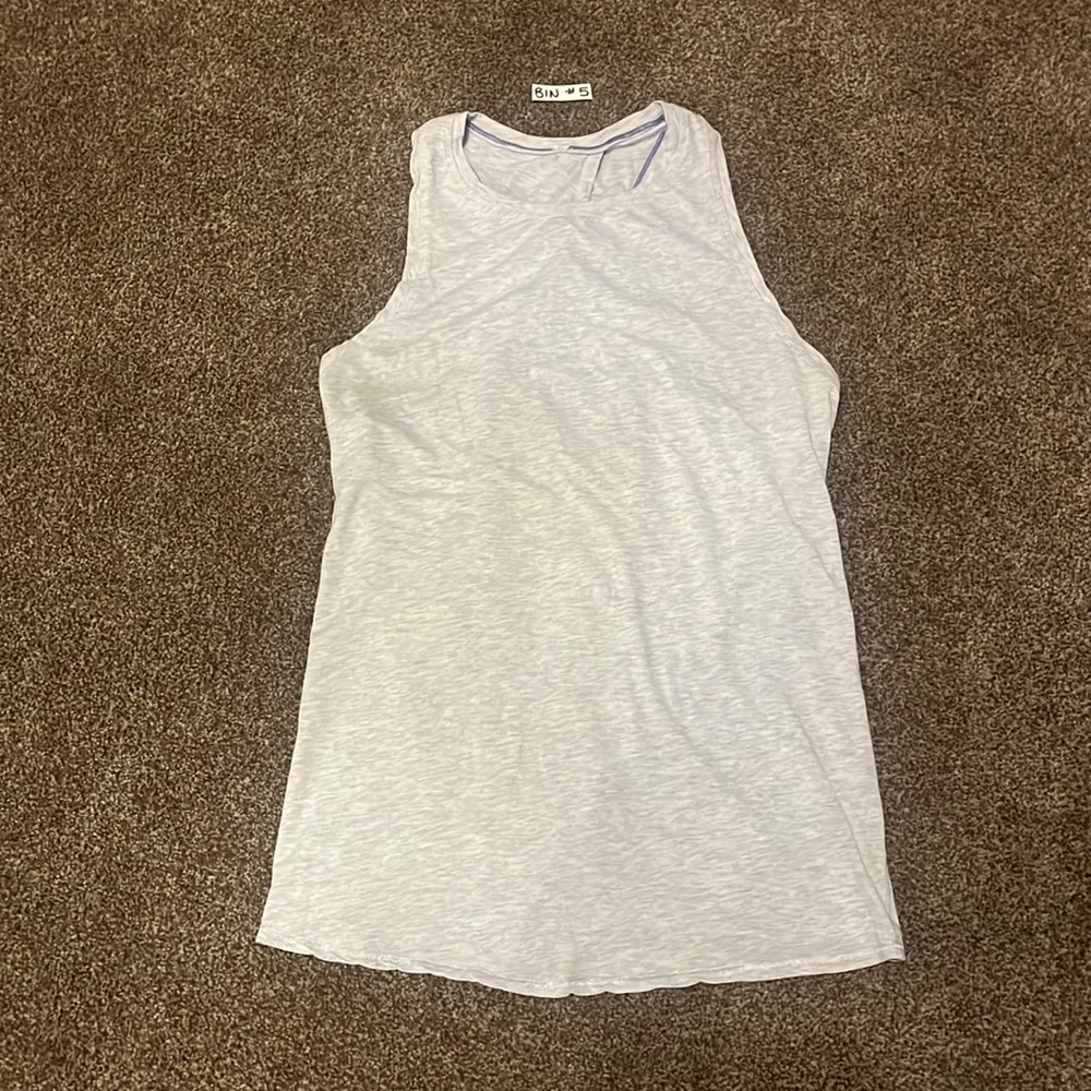 2/$30 Open back Lululemon tank. Fits like a medium